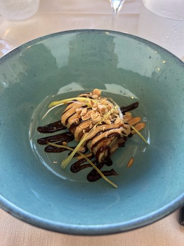 A main course plated for the table