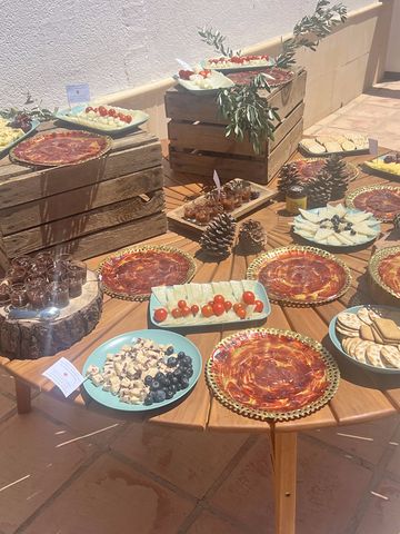 A buffet of small dishes on the terrace