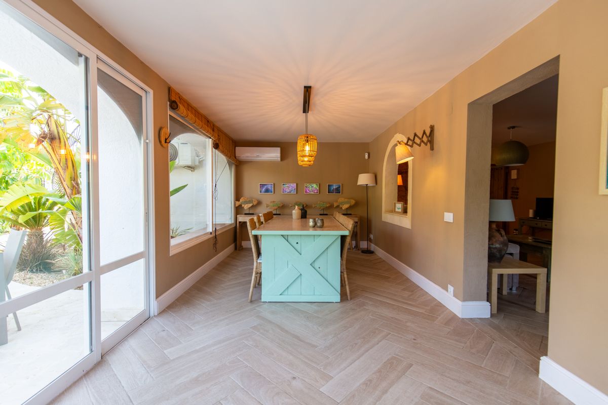 Living space with sliding doors to the garden — Nauticaa, wing one of Villa Palmview, Jávea