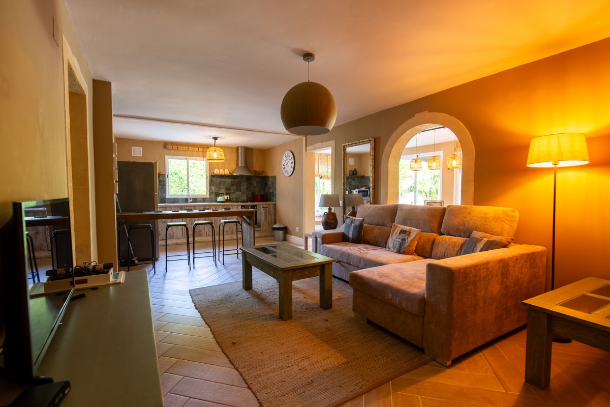 Living room with open kitchen — Nauticaa, wing one of Villa Palmview, Jávea