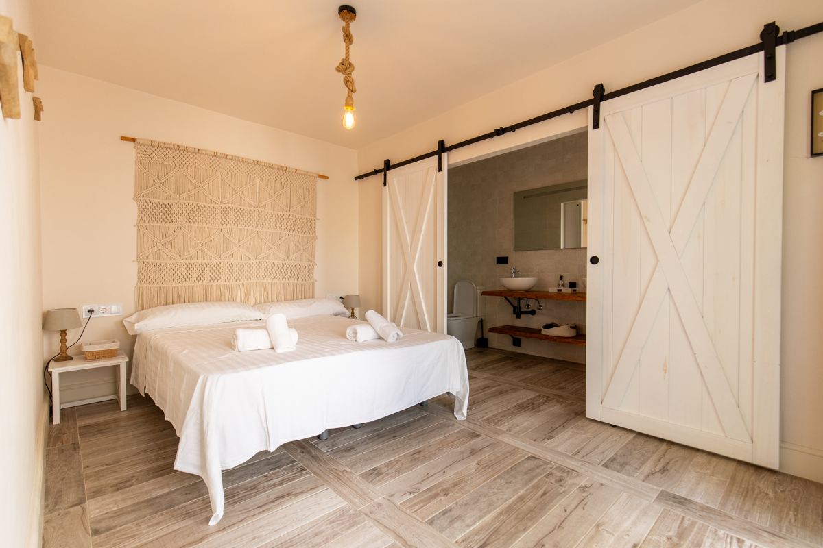 Bedroom with sliding door to the bathroom — 20,000 Leagues Under the Sea, wing two of Villa Palmview, Jávea