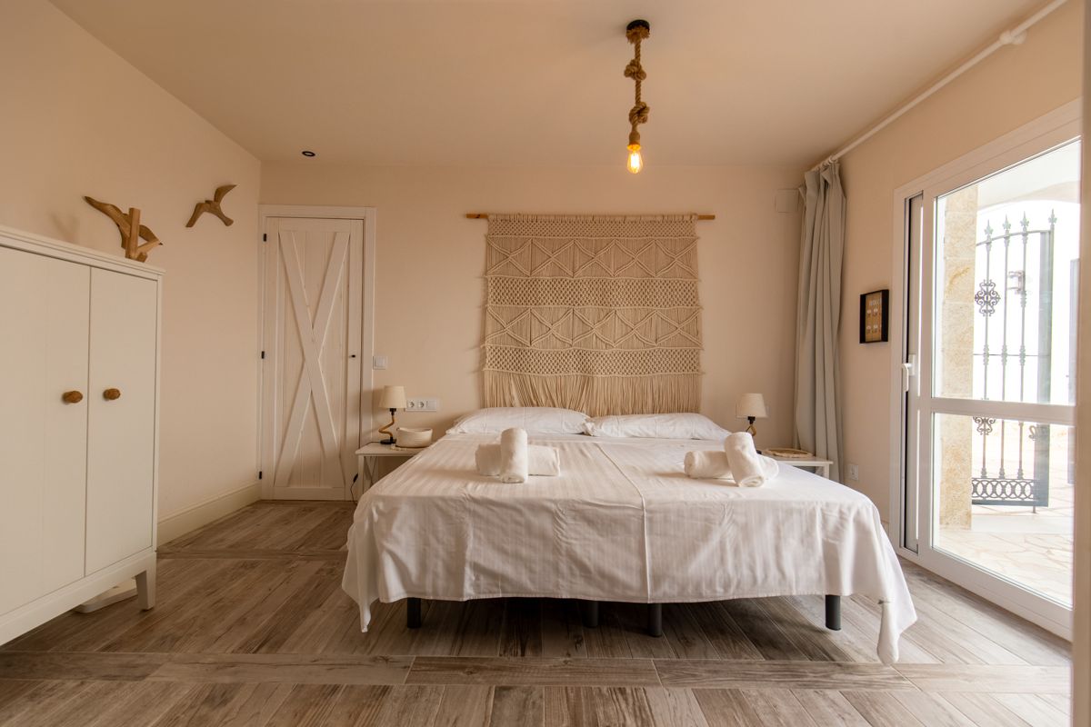 Bedroom with balcony doors — 20,000 Leagues Under the Sea, wing two of Villa Palmview, Jávea