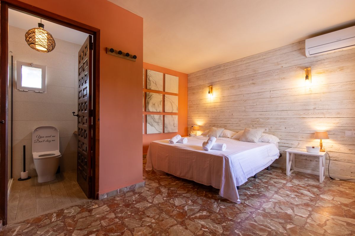Bedroom with an en-suite bathroom — Mystique Travels, wing three of Villa Palmview, Jávea