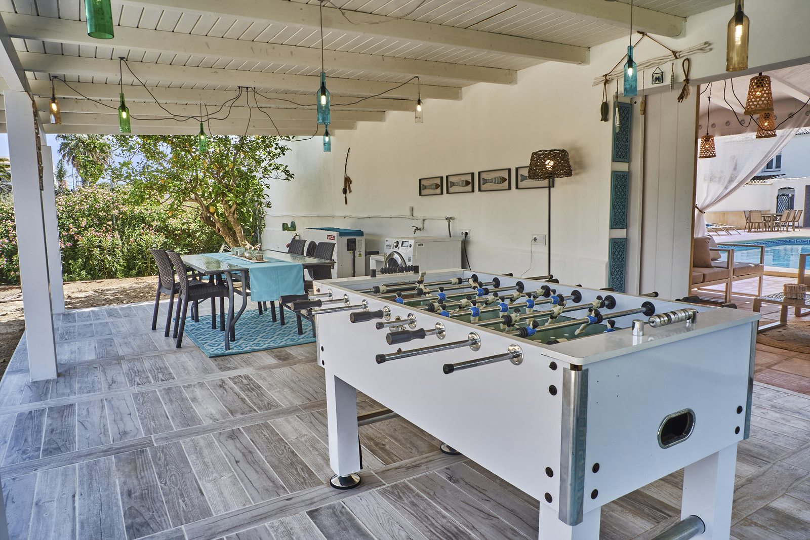 Table football on the covered terrace by the pool